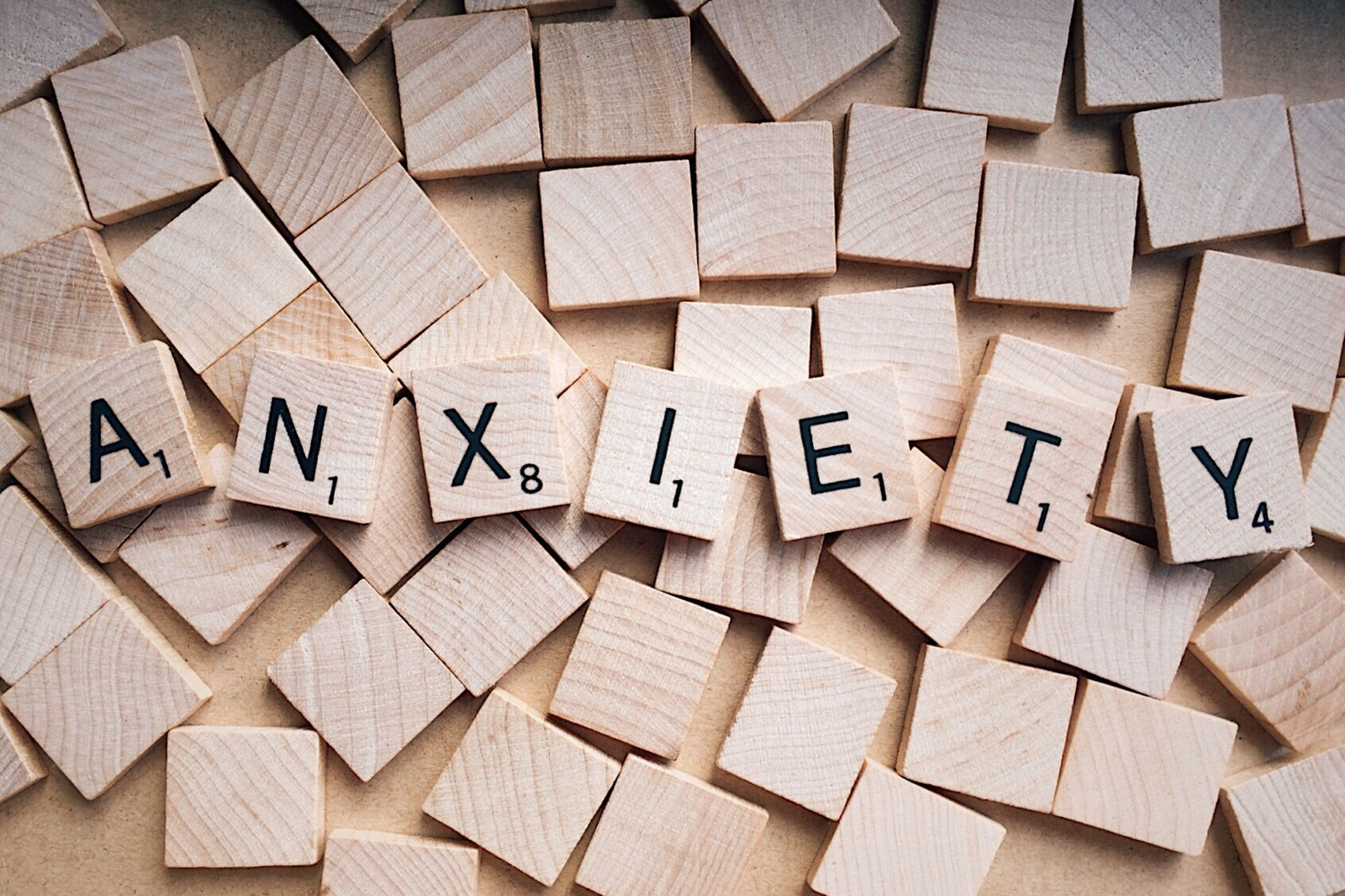 Canva - Word Anxiety Written on Wooden Scrabble Letters (1)