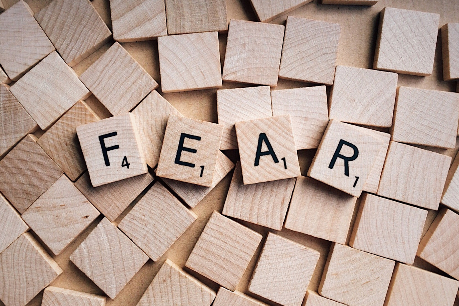 Canva - Word Fear Written on Wooden Scrabble Letters